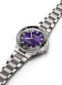 Oris Aquis Date Taste of Summer watch with purple dial and stainless-steel bracelet on a white background