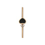 The Chopard Happy Hearts gold bar earring features a black spade shape and a small heart with a central diamond.