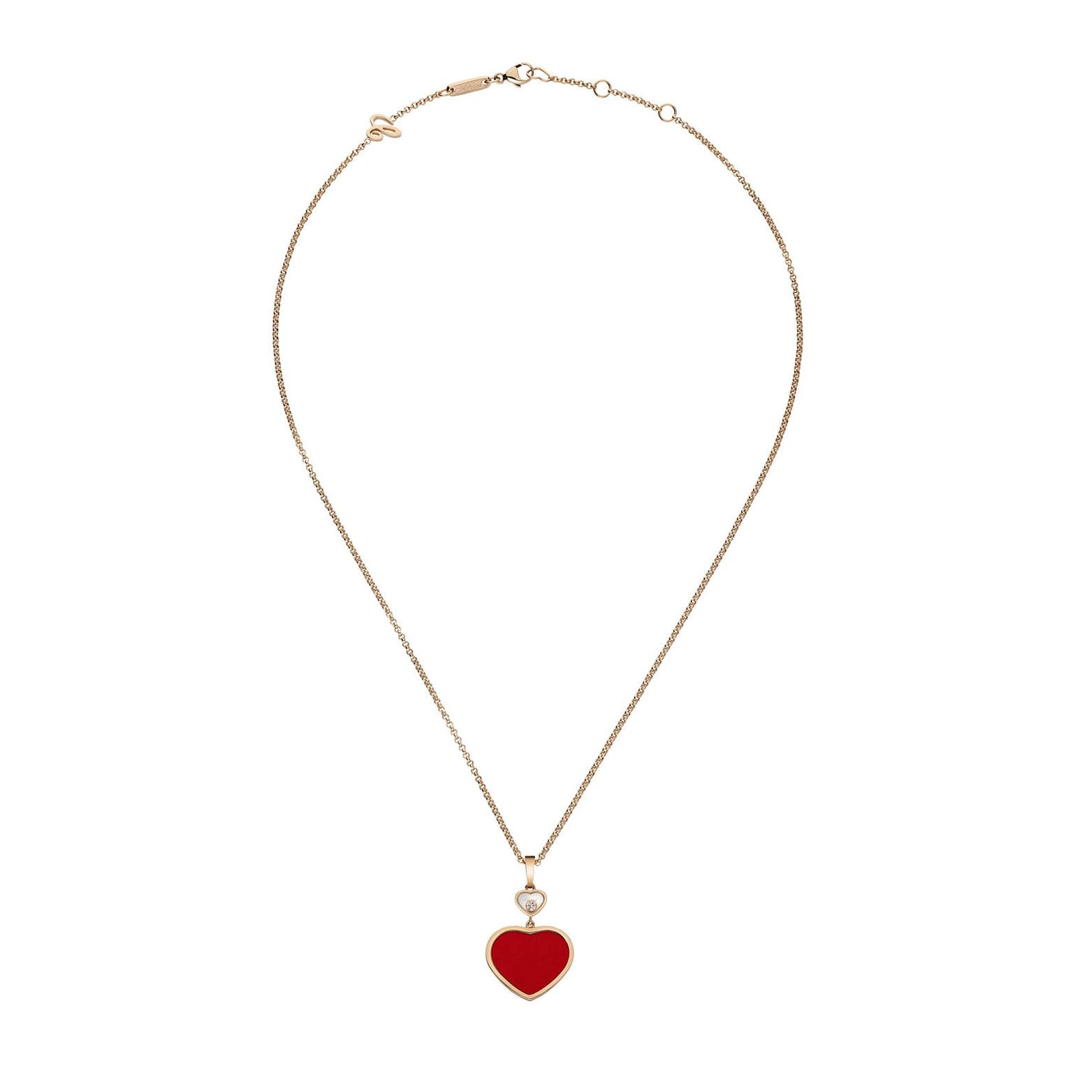 The Chopard Happy Hearts necklace features a delicate 18ct rose gold chain with a striking red heart-shaped pendant at the center.