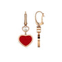 A pair of Chopard Happy Hearts gold earrings featuring red heart-shaped pendants with sparkling dancing diamonds set above each heart.