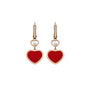 A pair of Chopard Happy Hearts gold dangle earrings with red heart-shaped pendants, small white heart accents, and central dancing diamonds.