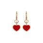 A pair of Chopard Happy Hearts gold drop earrings with small white hearts above larger red heart-shaped pendants, shown on a white background.