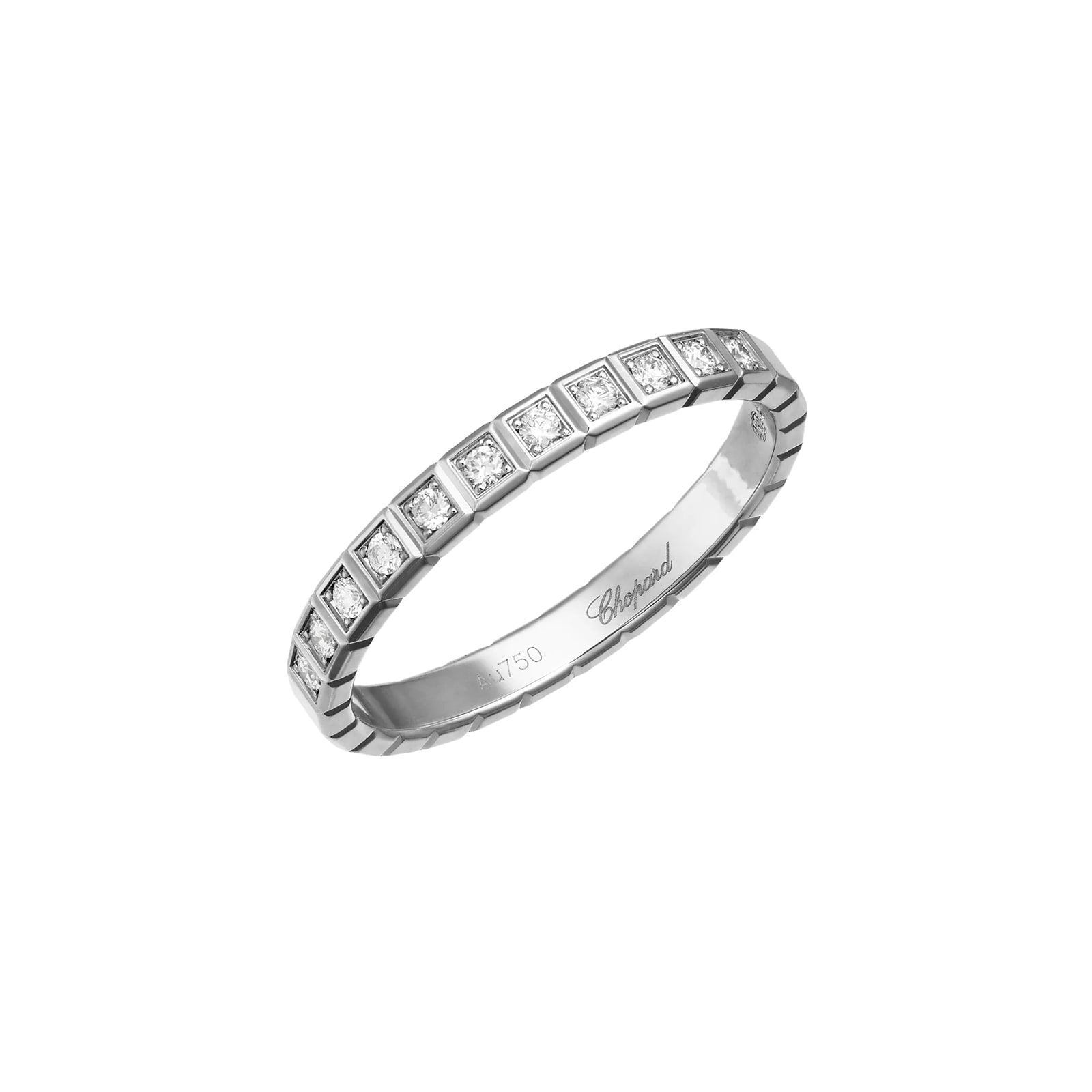 The Chopard Ice Cube ring features a white gold band set with square-cut diamonds around the top and minimalist engraving inside, reflecting elegant simplicity.