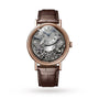 The Breguet Tradition Seconde Rétrograde 7097 is a luxury wristwatch with a brown leather strap, exposed mechanical movement, and a silver dial with Roman numerals—showcasing Swiss watchmaking artistry.