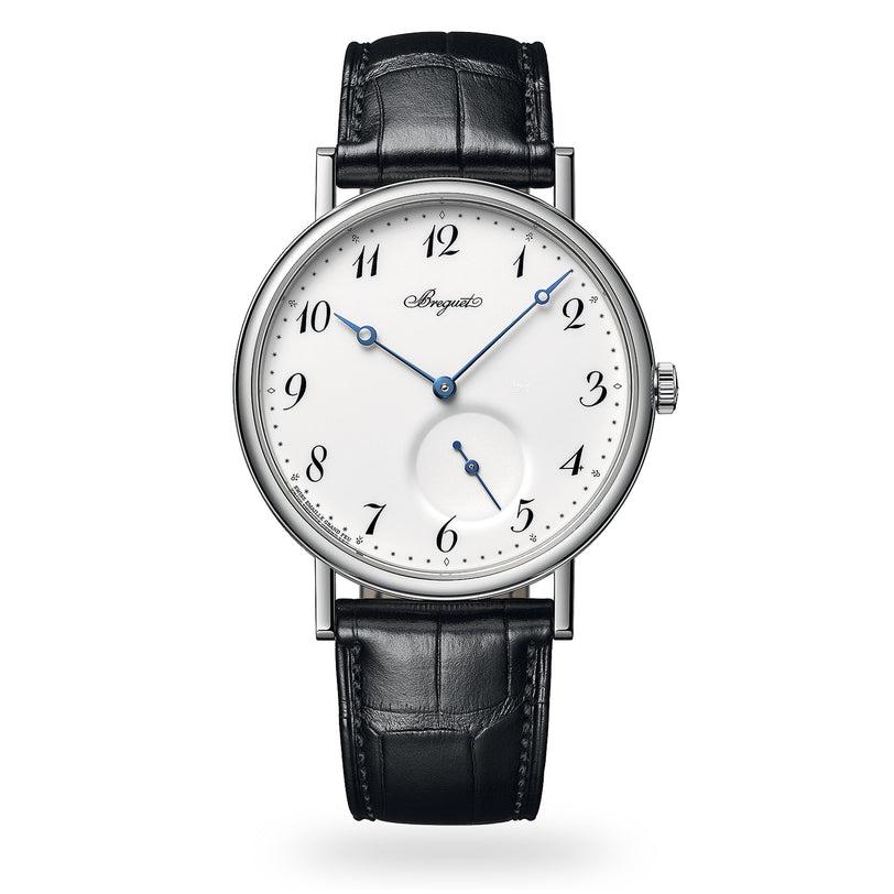 The Breguet Classique 7147 is a wristwatch inspired by Swiss watchmaking, featuring a white dial, black Arabic numerals, blue hands, a subdial at six o’clock, and a black leather strap.