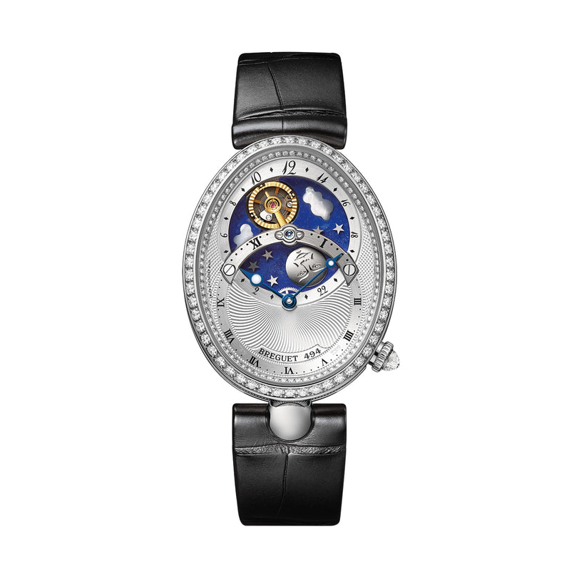 The Breguet Reine de Naples Jour/Nuit 8998 is a luxury oval watch with a black leather strap, silver case, open balance wheel, blue star and cloud motif, and a diamond-set bezel—an elegant option for both men and women.