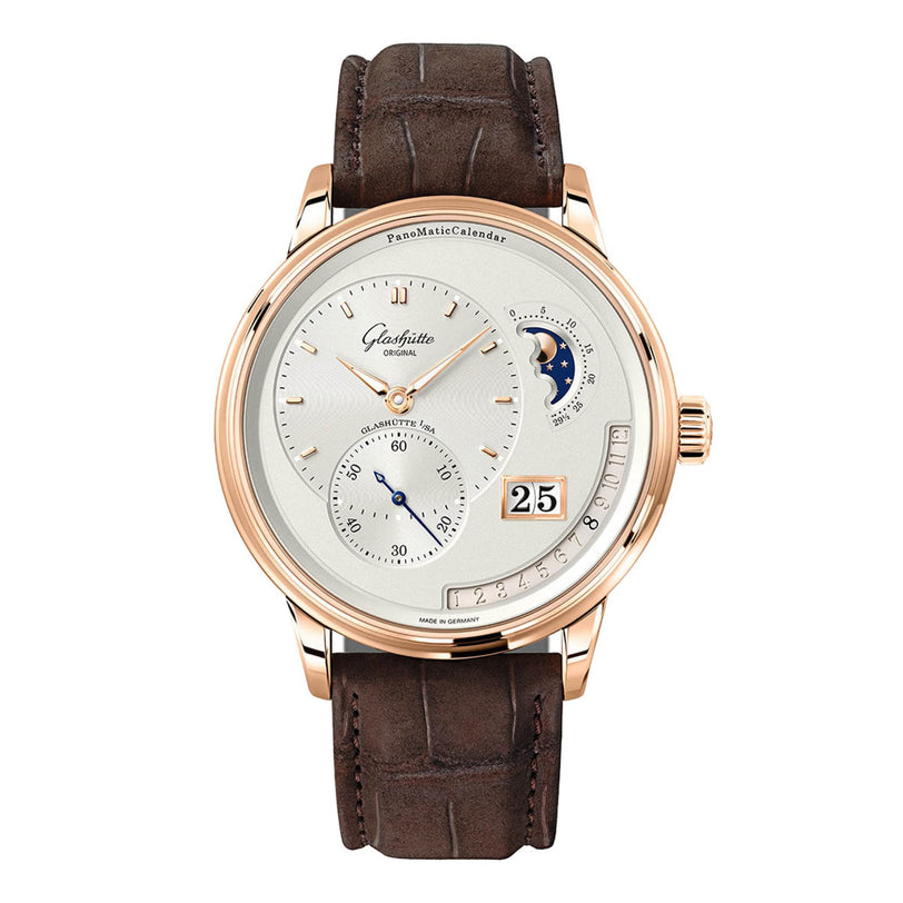 The Glashütte Original PanoMaticCalendar is a luxury wristwatch with a brown leather strap, gold casing, and multiple dials on a white face.