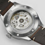 Close-up of the Hamilton Khaki Aviation Pilot Pioneer watch’s back, highlighting its automatic movement, metal case, visible gears, and engravings about water resistance and Swiss made—capturing its aviation-inspired design.