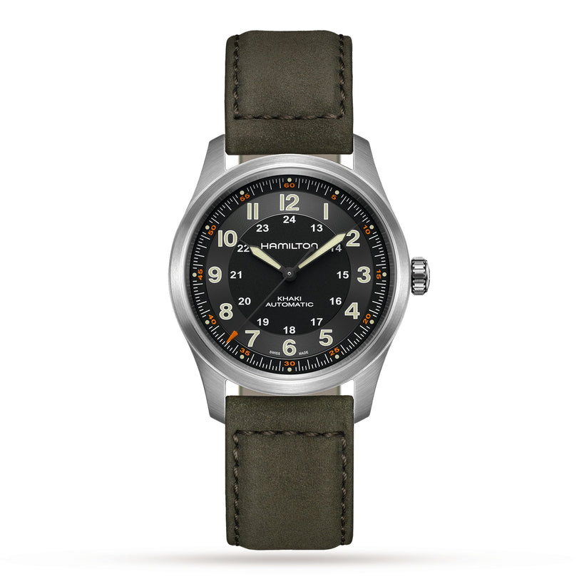 A Hamilton Khaki Field Titanium Auto watch with a green dial, white numerals, silver case, and green leather strap is displayed against a white background.