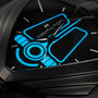 Close-up of the Hamilton Ventura XXL Bright Dune Limited Edition, a black triangular watch featuring blue luminescent dial accents and white hour markers. The hands are set to 10:08, and it comes in special commemorative packaging.