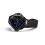 The Hamilton Ventura Edge Dune Limited Edition features a futuristic black triangular face with digital blue numbers and a black rubber strap, echoing bold Dune Part Two style, and is elegantly showcased on a white background.