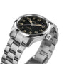 The Hamilton Khaki Field Murph 38mm is a stainless steel wristwatch featuring a black dial, Arabic numerals, metal link bracelet, and the Hamilton brand name on the face, showcasing classic design.