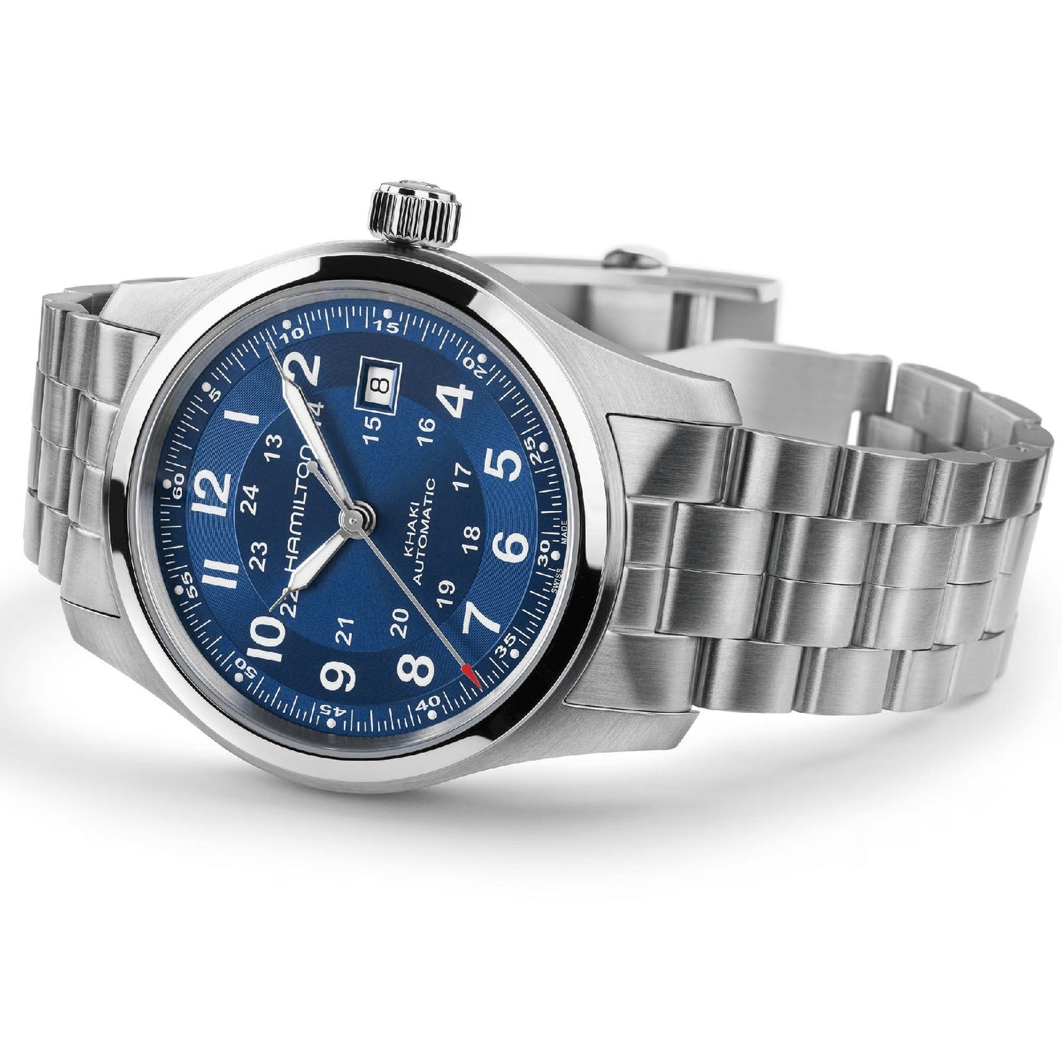 The Hamilton Khaki Field Auto 42mm features a stainless steel case, blue dial with silver markers, date at 3 o’clock, metal link bracelet, and is powered by the reliable H-10 automatic caliber, reflecting its military heritage.