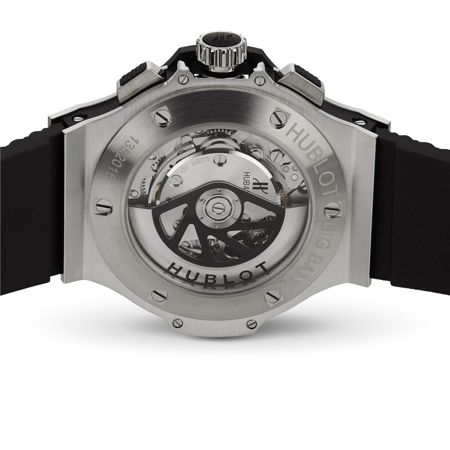 Close-up of the Hublot Big Bang Original Steel watch’s back, showcasing its chronograph movement through a transparent case back with engraved branding and a black rubber strap, underscoring its sporty design.