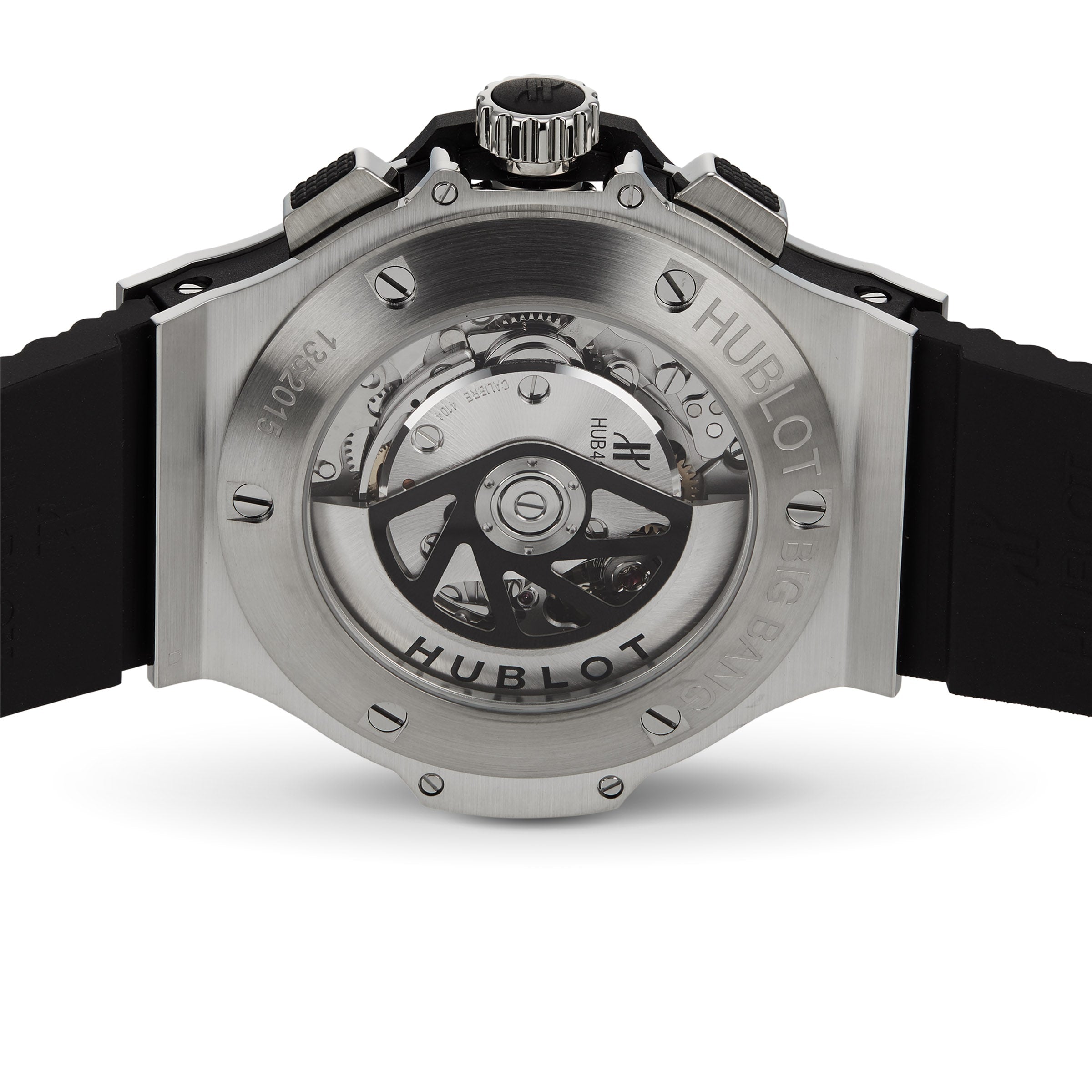 Close-up of the Hublot Big Bang Original Steel watch’s back, showcasing its chronograph movement through a transparent case back with engraved branding and a black rubber strap, underscoring its sporty design.