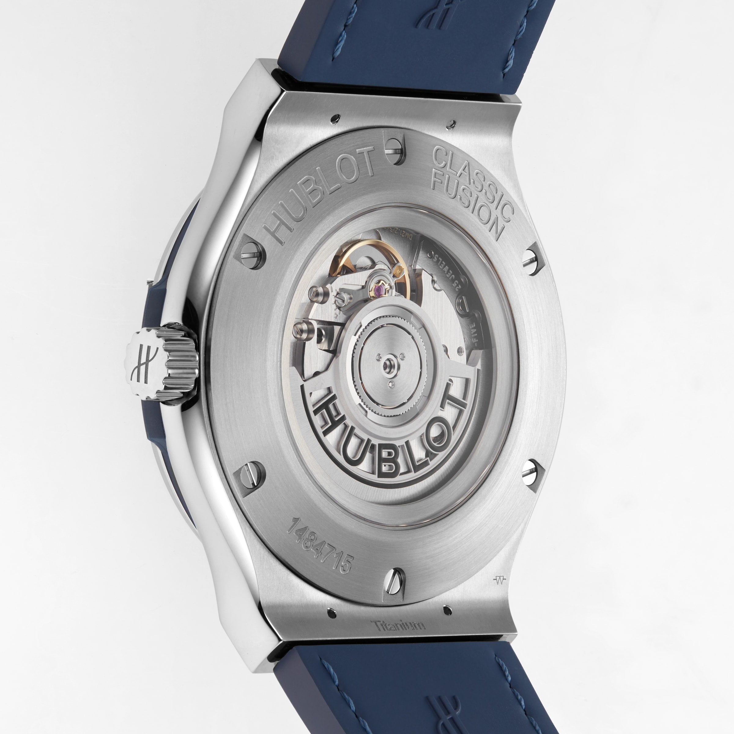 Close-up of the Hublot Classic Fusion Titanium Blue watch back, showcasing its automatic movement through a transparent case back and finely engraved branding on the titanium case.