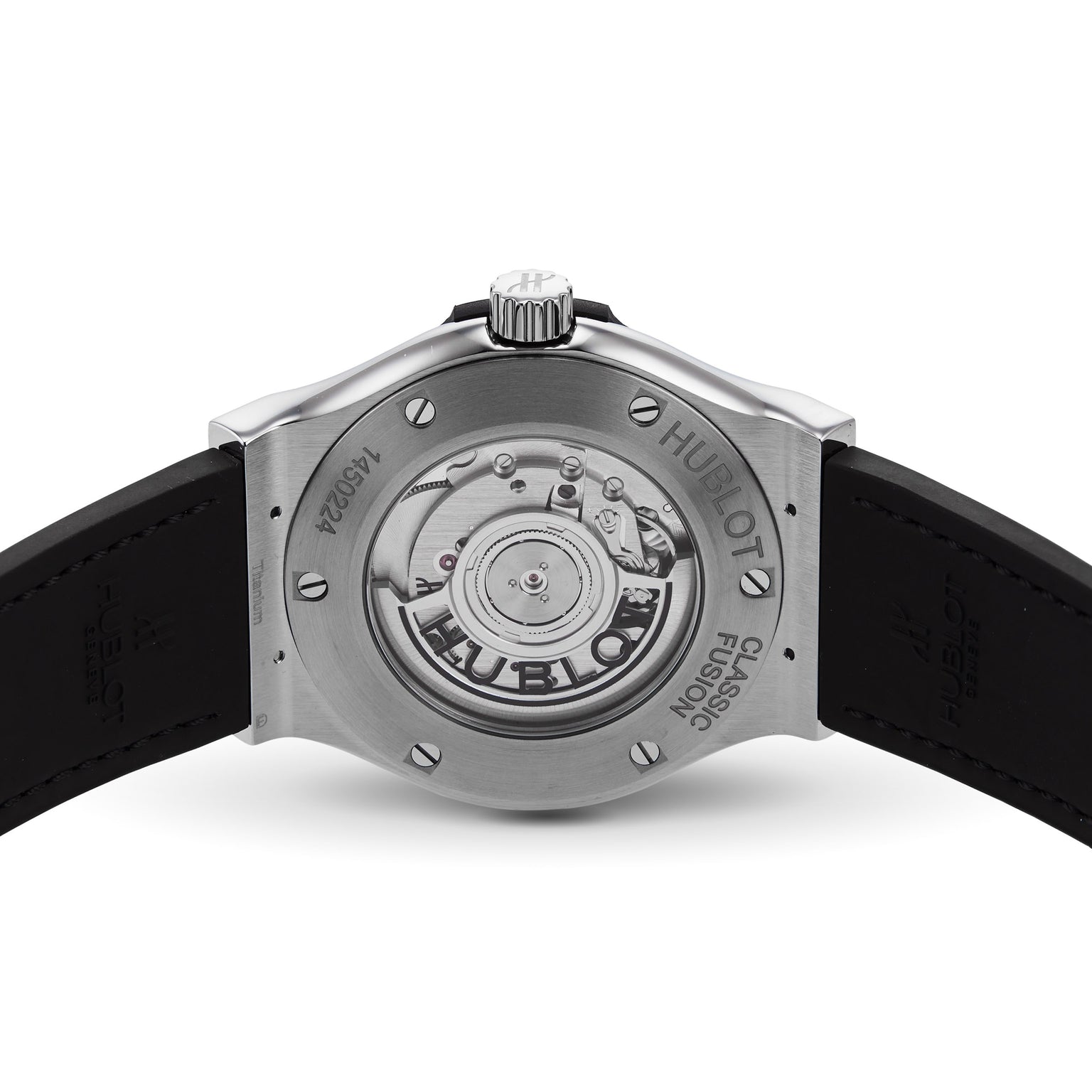 A close-up of the Hublot Classic Fusion Titanium watch highlights its titanium case and showcases the exposed automatic movement visible through the transparent case back.