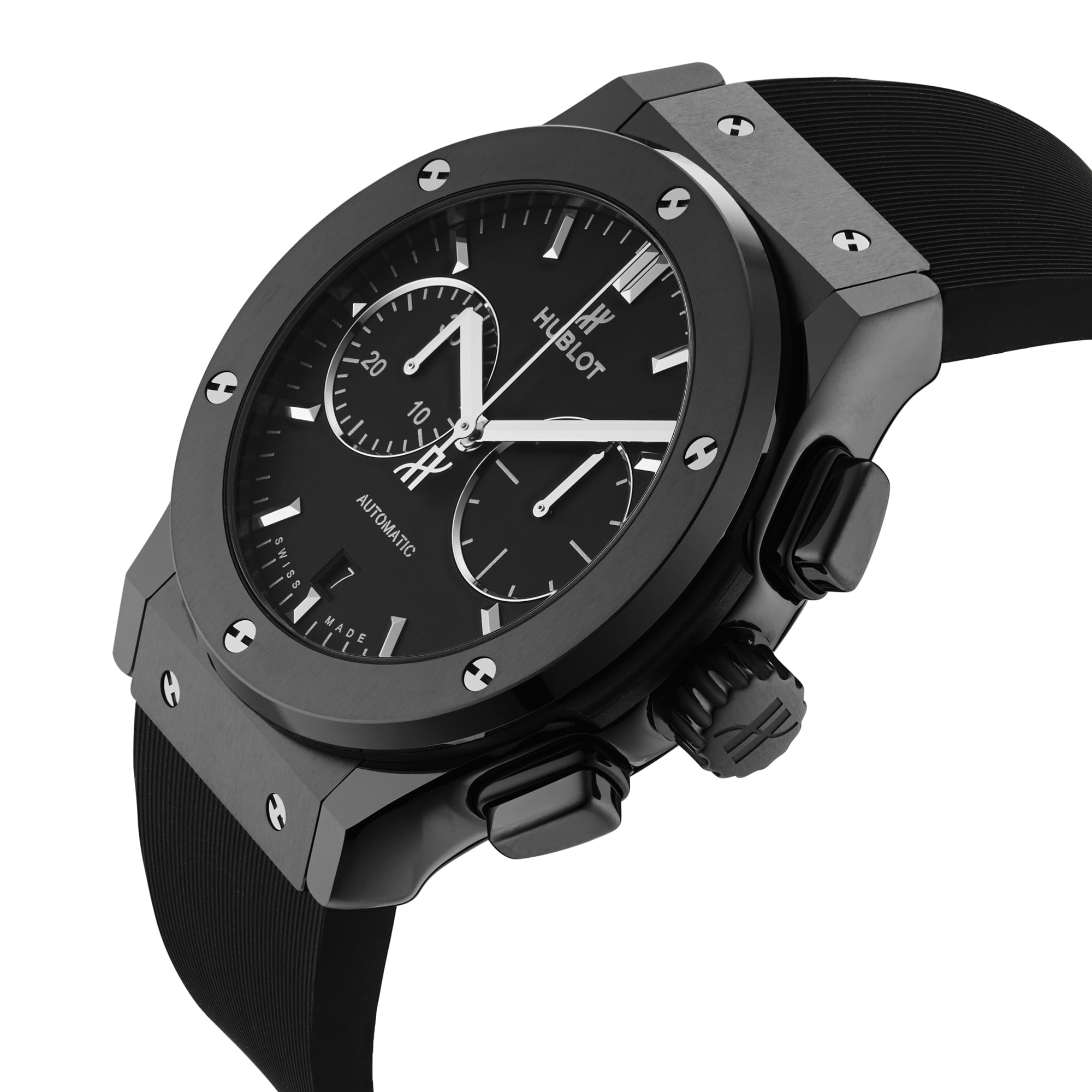 A Hublot Classic Fusion Chronograph Black Magic wristwatch with a black ceramic case, black rubber strap, silver hour markers, and two subdials powered by the HUB1143 self-winding movement, viewed at an angle.