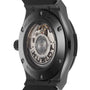 Close-up of the Hublot Classic Fusion Black Magic watch’s back, showcasing its exposed automatic movement and engraved branding, all set in sleek black high-tech ceramic.