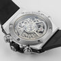 Close-up of the back of the Hublot Big Bang Unico Titanium, highlighting its exposed UNICO manufacture chronograph flyback movement and black rubber strap.