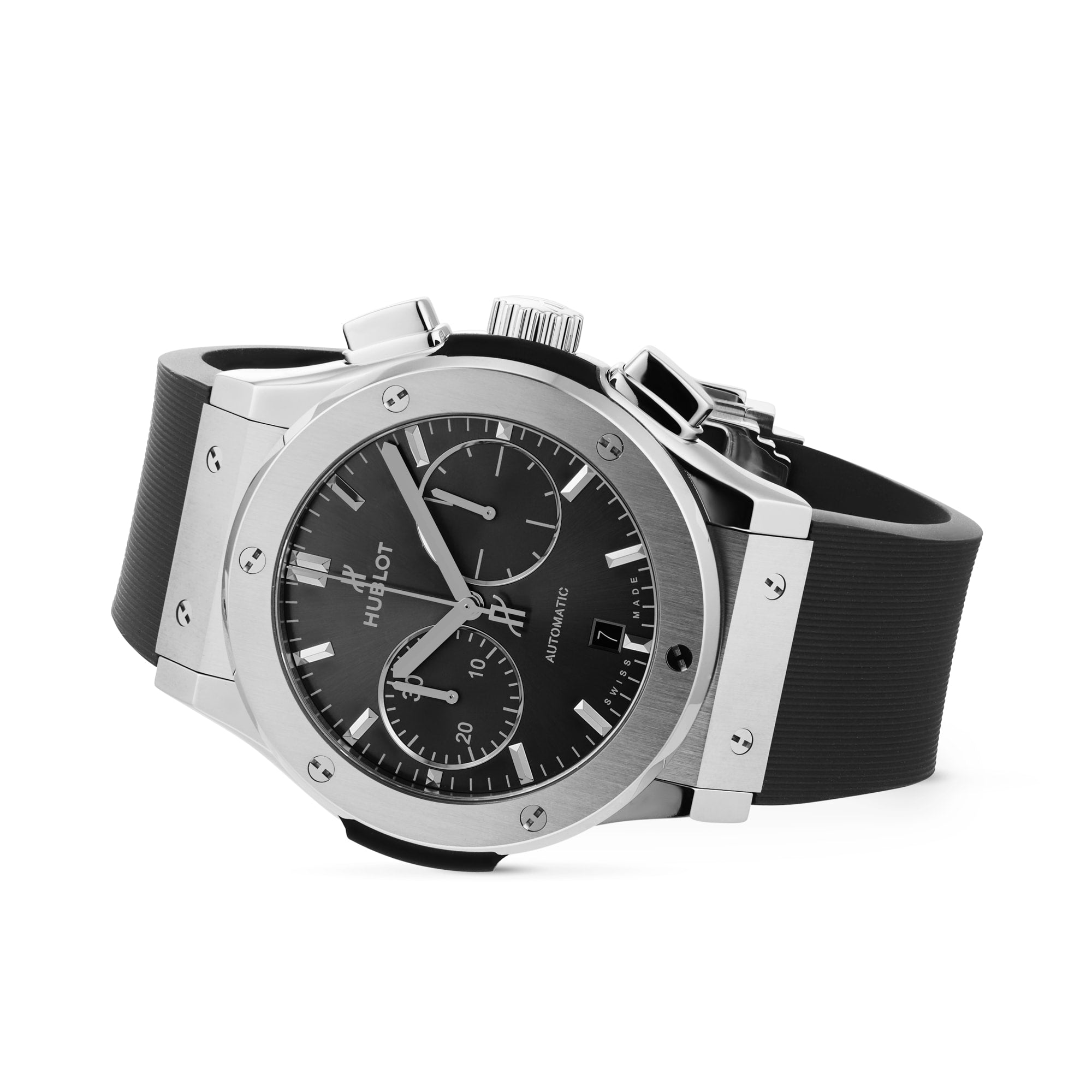 The Hublot Classic Fusion Racing Grey Chronograph Titanium, featuring a titanium case, black dial with chronograph and date display, and a black rubber strap, is displayed on a white background.