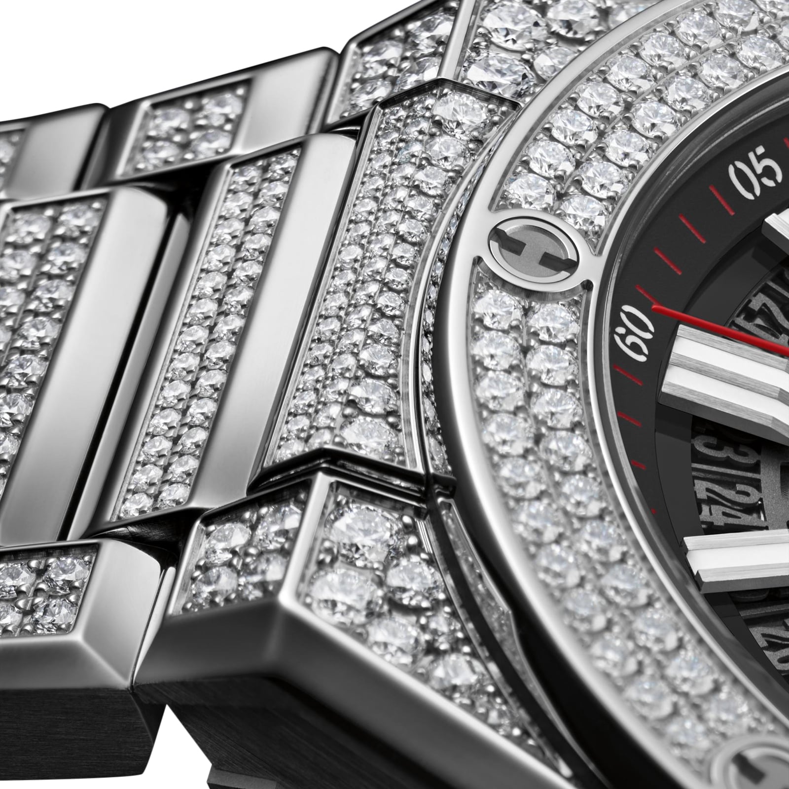 Close-up of the Hublot Big Bang Integrated Time Only Titanium Pavé, a luxury wristwatch with a titanium case, metal band, and diamond-encrusted bezel and bracelet—an exquisite piece from Hublot.