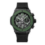 The Hublot Big Bang Unico The Watches of Switzerland Group Exclusive is a black and green chronograph wristwatch with a skeleton dial and black fabric strap, featuring detailed internal mechanics in a striking limited-edition design.