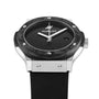 The Hublot Classic Fusion Centenary Special Edition The Watches of Switzerland Group Exclusive is a black wristwatch with a silver bezel and black rubber strap, displayed showing the time 10:10.