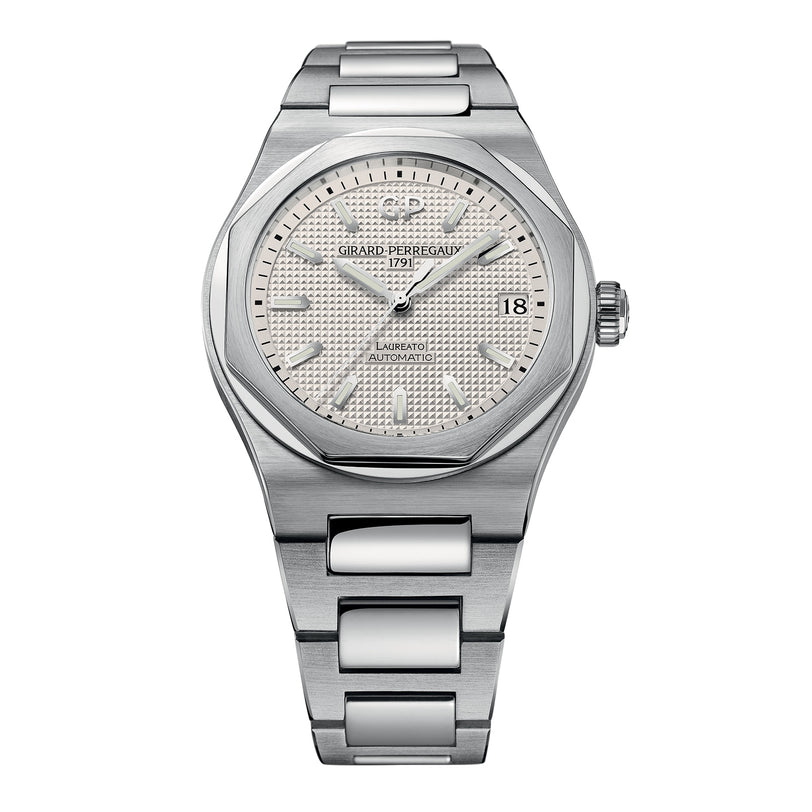 The Girard-Perregaux Laureato 42 is a stainless steel watch featuring an octagonal bezel, silver textured dial, date display at 3 o’clock, and a metal link bracelet.