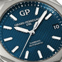 Close-up of the Girard-Perregaux Laureato 42, featuring a blue textured dial, silver hands and indices, an octagonal bezel, stainless steel case, and a date window at the 3 o’clock position.