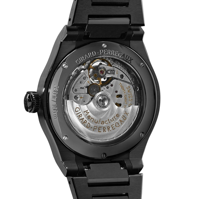 The image displays the caseback of the Girard-Perregaux Laureato 42 watch, revealing its visible automatic movement, engraved case details, and elements of its unique octagonal bezel.