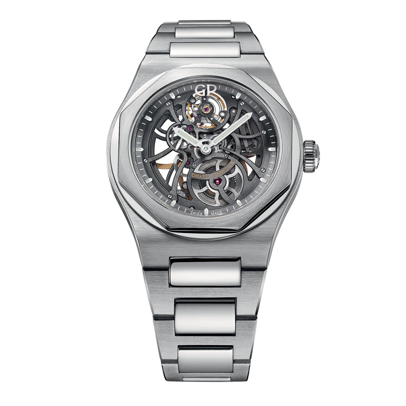 The Girard-Perregaux Laureato Skeleton is a stainless steel watch featuring a visible mechanical movement, octagonal bezel, silver-tone case, and matching metal bracelet.