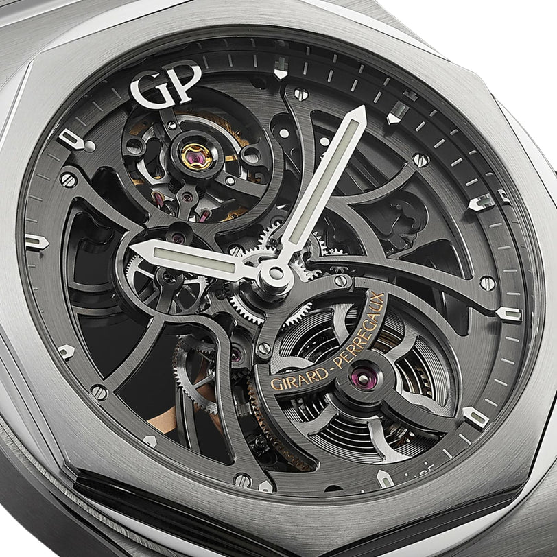 Close-up of the Girard-Perregaux Laureato Skeleton watch, highlighting its intricate gears and the “Girard-Perregaux” name on the mechanism.