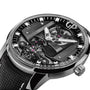 Close-up of the Girard-Perregaux Free Bridge wristwatch, showcasing a black open-worked dial with visible automatic movement and GP initials, paired with a textured black strap.