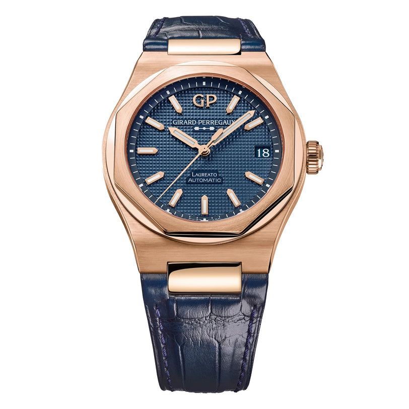 The Girard-Perregaux Laureato 42 features a pink gold case, blue textured dial with gold hour markers, date at 3 o’clock, blue leather strap, and the brand name elegantly on the face.