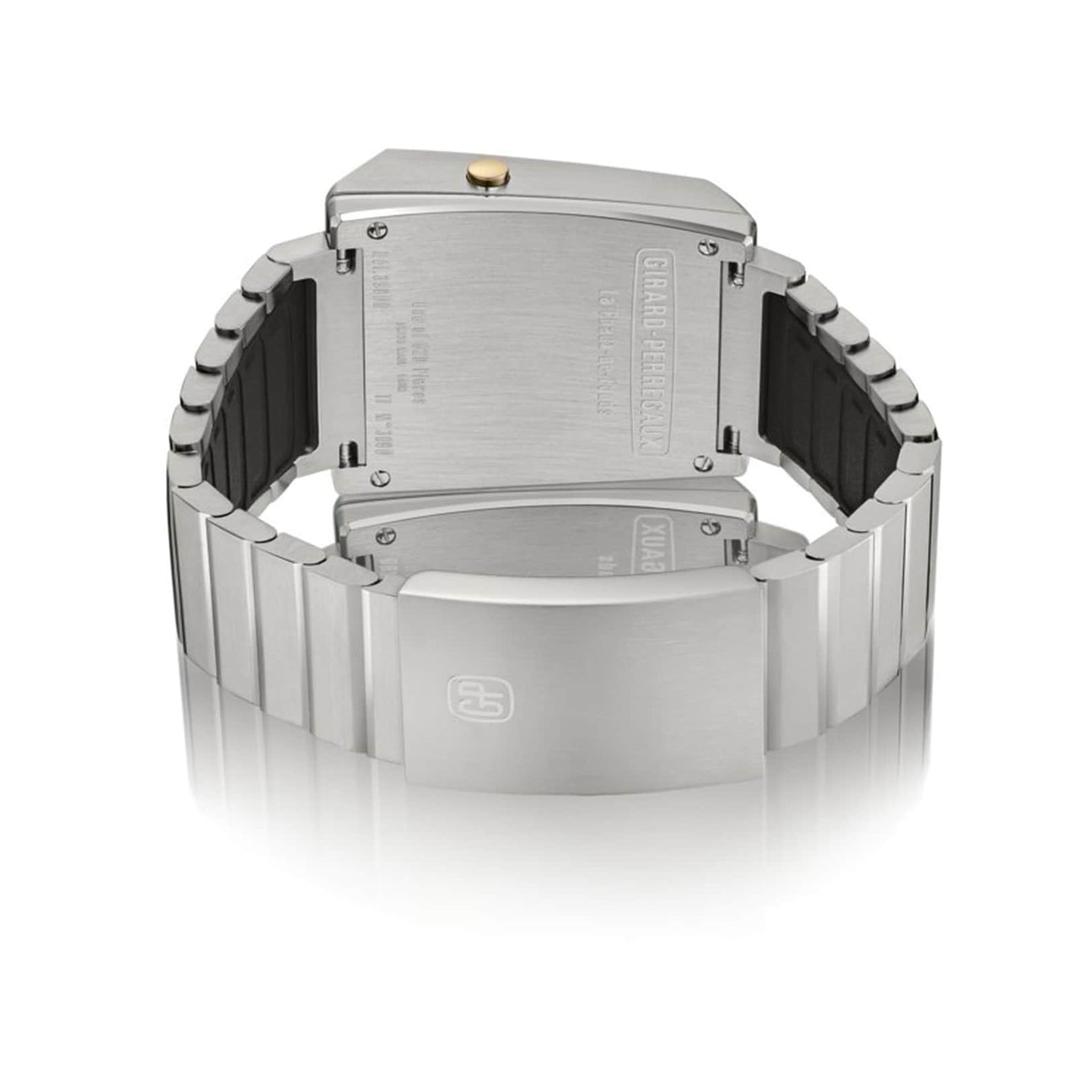 Back view of the Girard-Perregaux Casquette 2.0 Titanium & Gold, featuring a metal bracelet with clasp and engraved brand markings on the case and links.