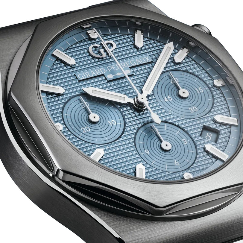 Close-up of a Girard-Perregaux Laureato Chronograph Ice Blue wristwatch featuring a textured Ice Blue Clous de Paris dial, three subdials, silver hour markers, and a stainless steel case.