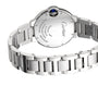 Back view of the Ballon Bleu de Cartier watch by Cartier, featuring engraved details and a blue gemstone set on the crown.