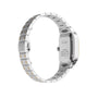 A silver Santos de Cartier wristwatch by Cartier, featuring a metal link bracelet and case back with brand engraving and visible screws—a minimalist design that honors Cartiers aviation heritage.