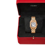 The Panthère de Cartier watch by Cartier, featuring a rose gold rectangular face with Roman numerals, is displayed in an open red Cartier box with a black interior.