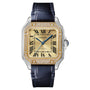 The Santos de Cartier Chronograph by Cartier features a square gold face, diamond bezel, Roman numeral markers, signature blue hands, and a black leather strap.