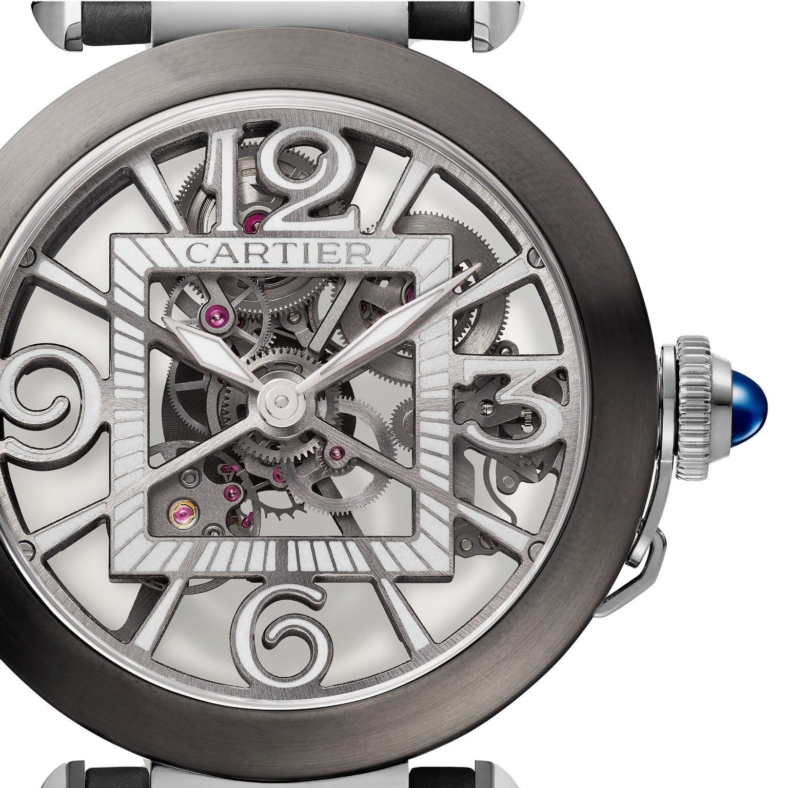 Close-up of the Cartier Pasha de Cartier Skeleton watch, highlighting its intricate skeleton design with exposed gears, refined metalwork, and signature blue cabochon crown that displays its remarkable mechanical movement.