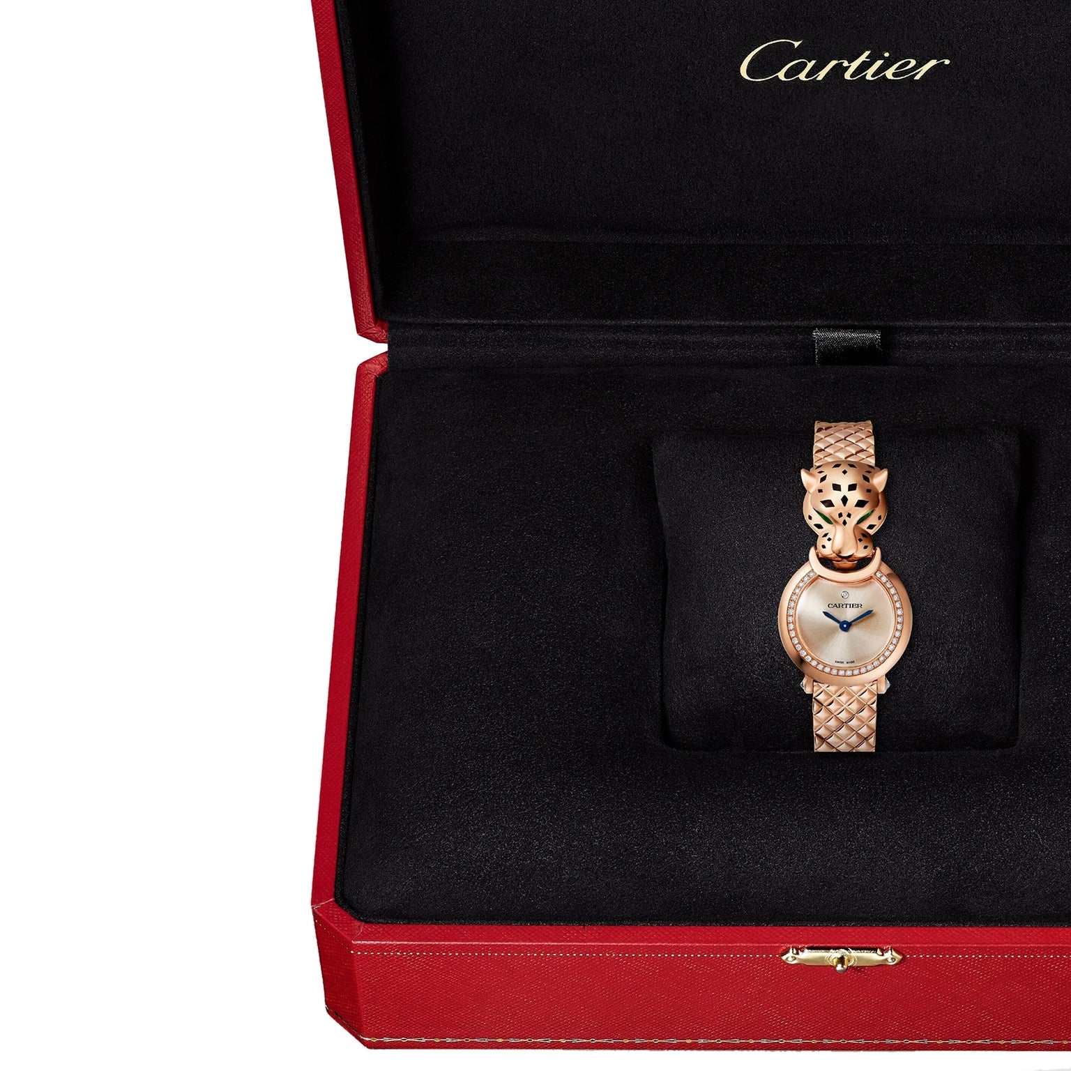 A gold La Panthère de Cartier watch by Cartier in a red and black Cartier box.