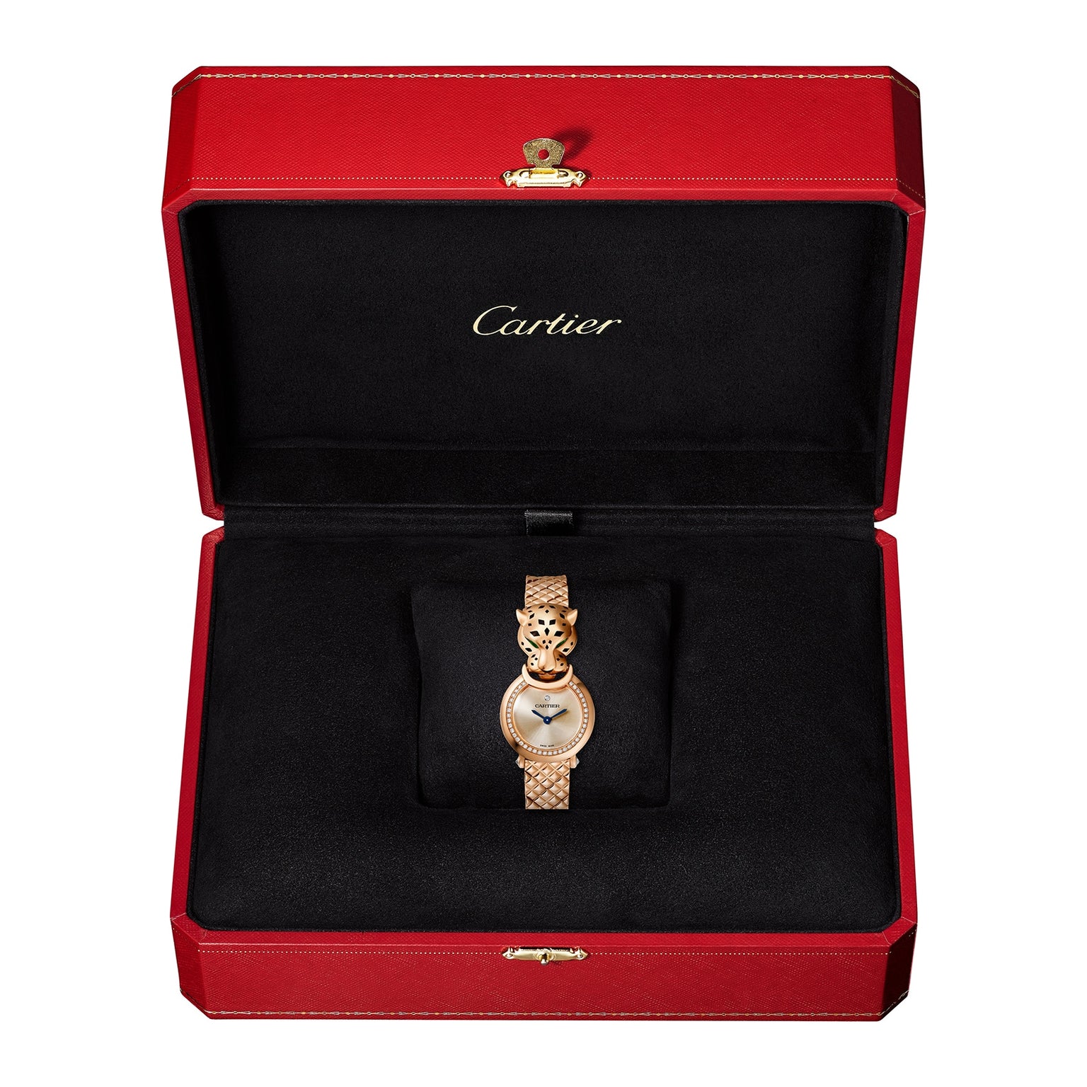 The La Panthère de Cartier gold watch by Cartier, featuring a panther design, is displayed in an open red and black Cartier box.