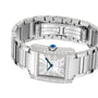 The Cartier Tank Française features a rectangular face with Roman numerals, a diamond-encrusted bezel, blue cabochon crown, and stainless steel bracelet—a silver wristwatch thats truly iconic.