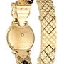 Close-up of the back of a luxury Cartier La Panthère de Cartier watch, showing engraved details, serial number, and its patterned gold bracelet.