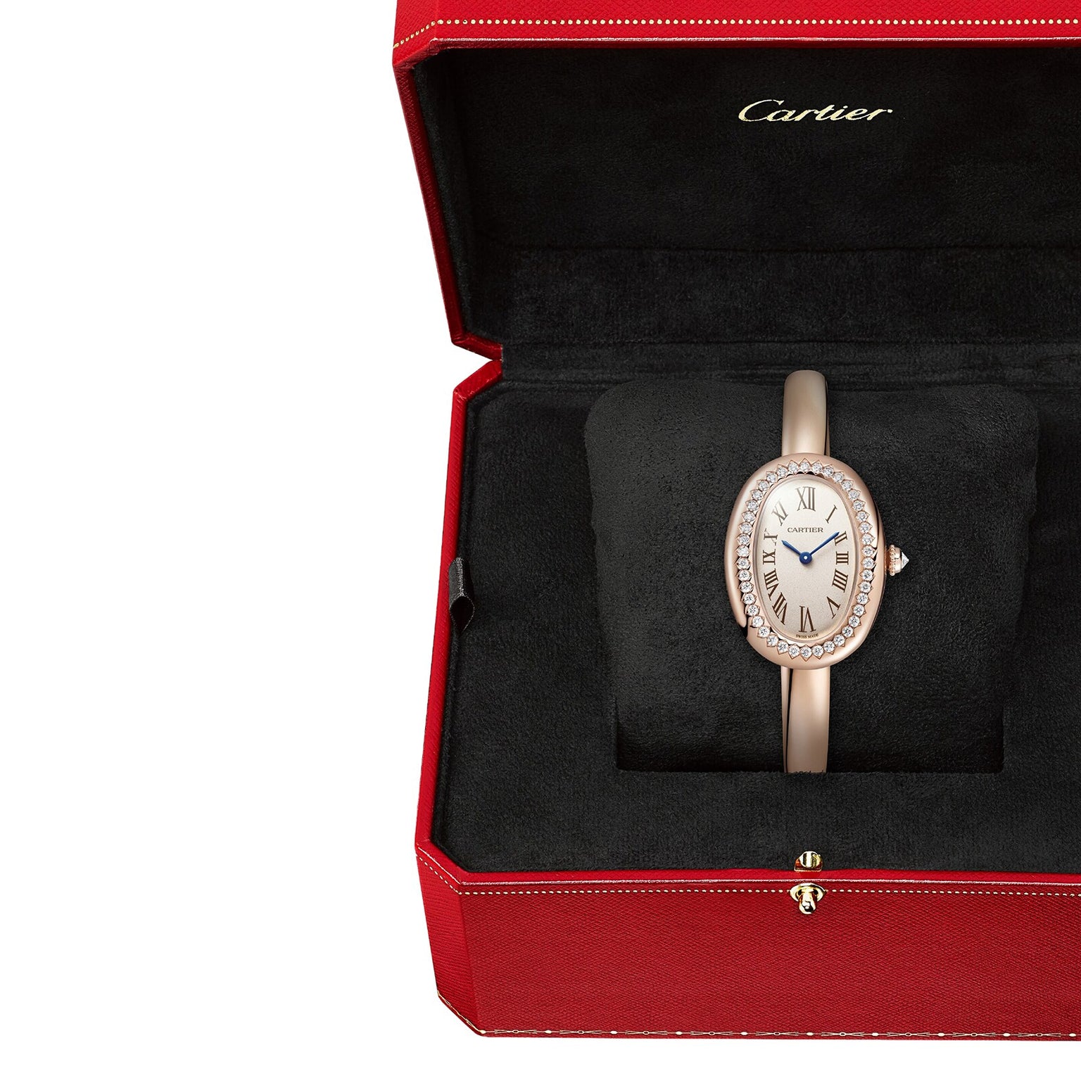 A Cartier Baignoire gold watch with a diamond bezel, presented in a red Cartier box lined with black velvet.