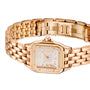 The Panthère de Cartier Small Model by Cartier is an 18K rose gold watch with a square face, Roman numerals, diamond-set bezel, and linked bracelet band. The clasp is open.