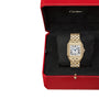 The Panthère de Cartier, a gold wristwatch with a rectangular face and Roman numerals, is displayed in an open red Cartier box—an elegant testament to the timeless style of Cartier.