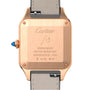 Back view of the Cartier Santos-Dumont watch in 18K rose gold, showcasing brand engraving, serial numbers, water resistance, Swiss made mark, and a refined alligator leather strap.